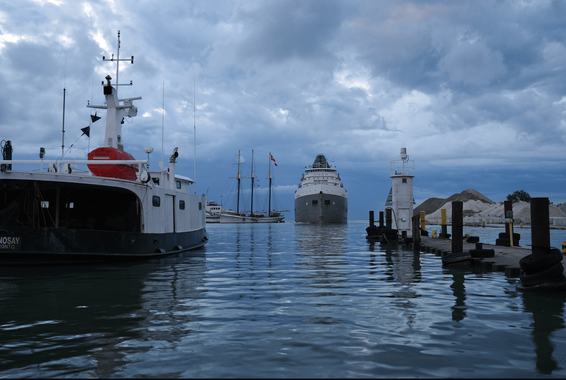 The Boss. Saginaw, a self discharging great lakes freighter arrives during the Kingsville, 2018 Tall Ships festival. IOSO 100, f/10 @ 1/8 sec.