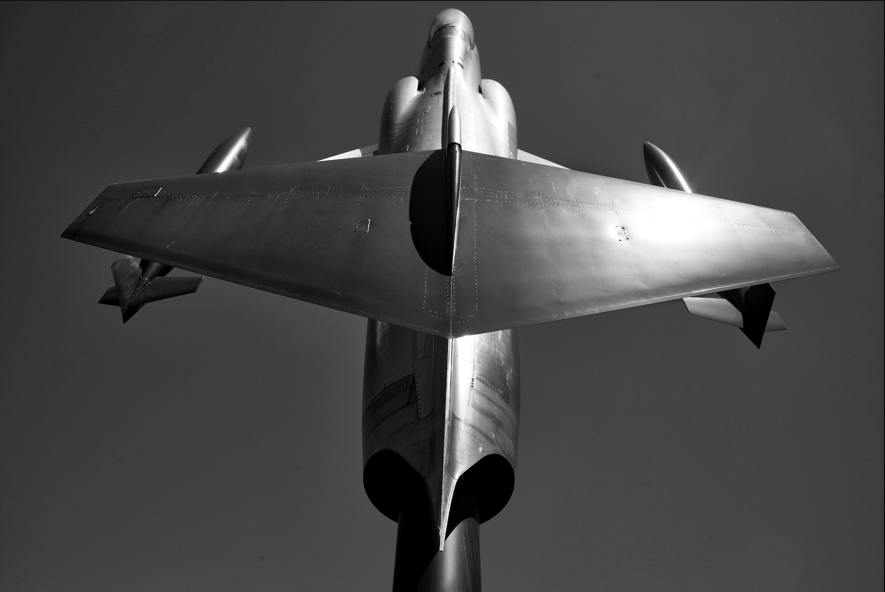 a starfighter on a museum display post