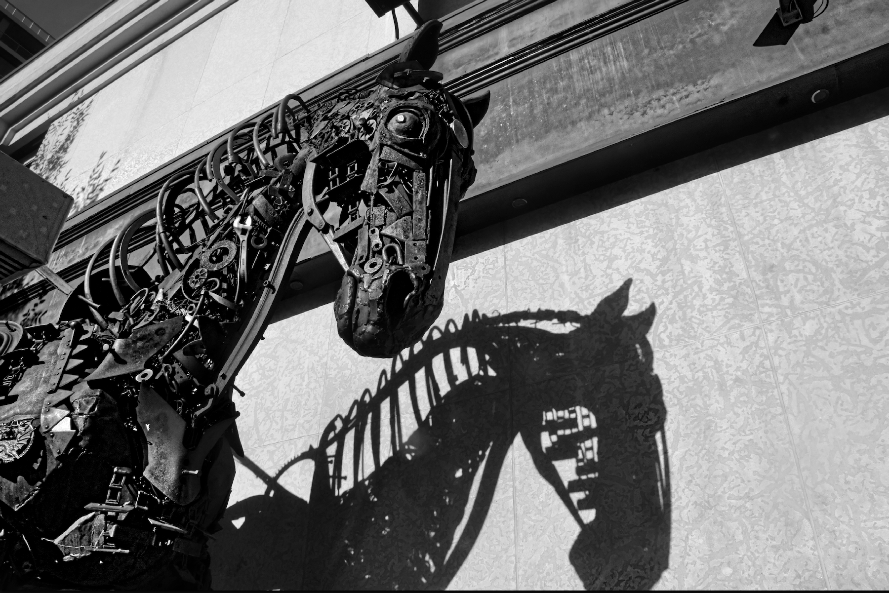 a statue of a horse made from various car parts and tools located in Calgary