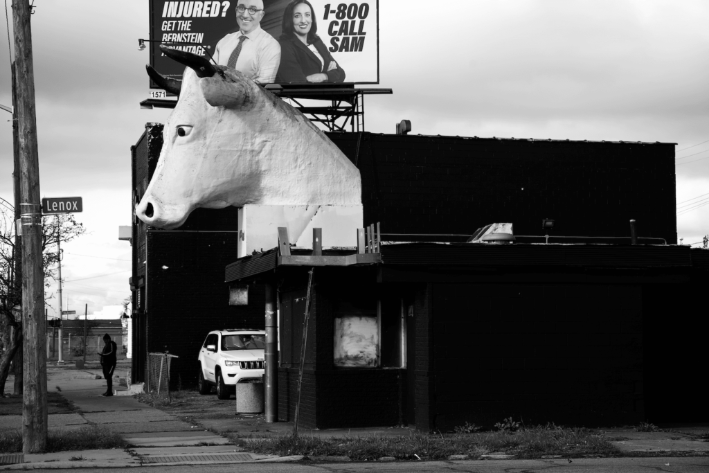 GIANT COWS HEAD ON THE ROOF OF A DETROIT BUILDING