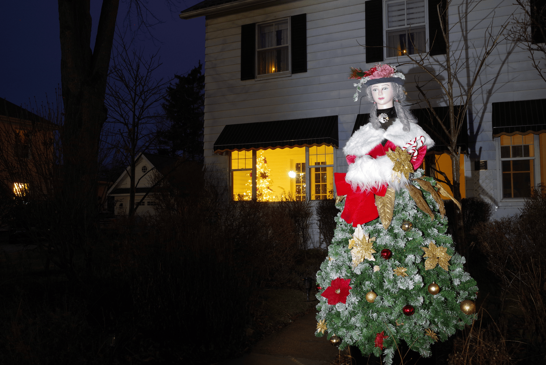 traditional outdoor Christmas decoration of a women mannequin
